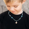 pojke med bernie halsband