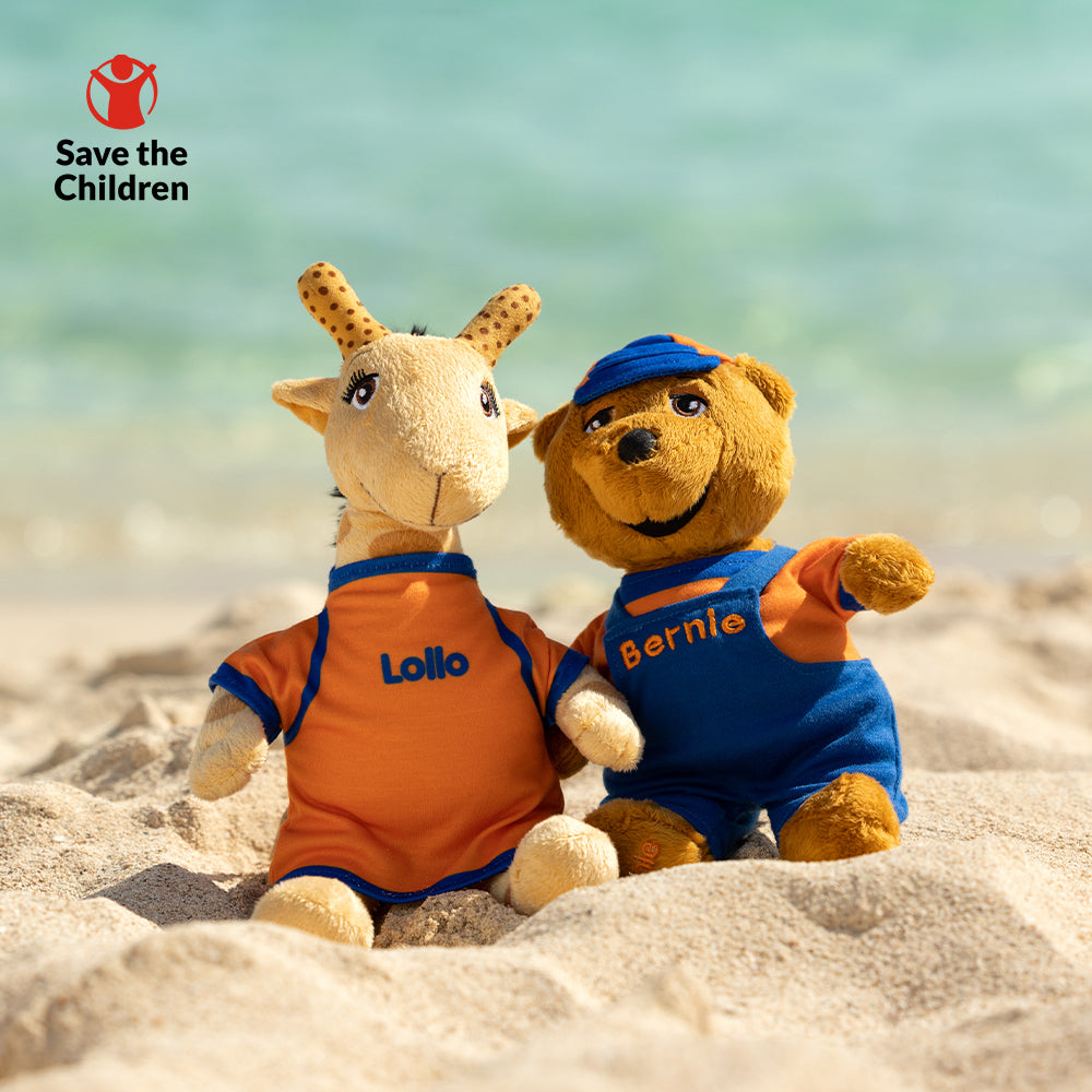 lollo och bernie gosedjur sitter på stranden